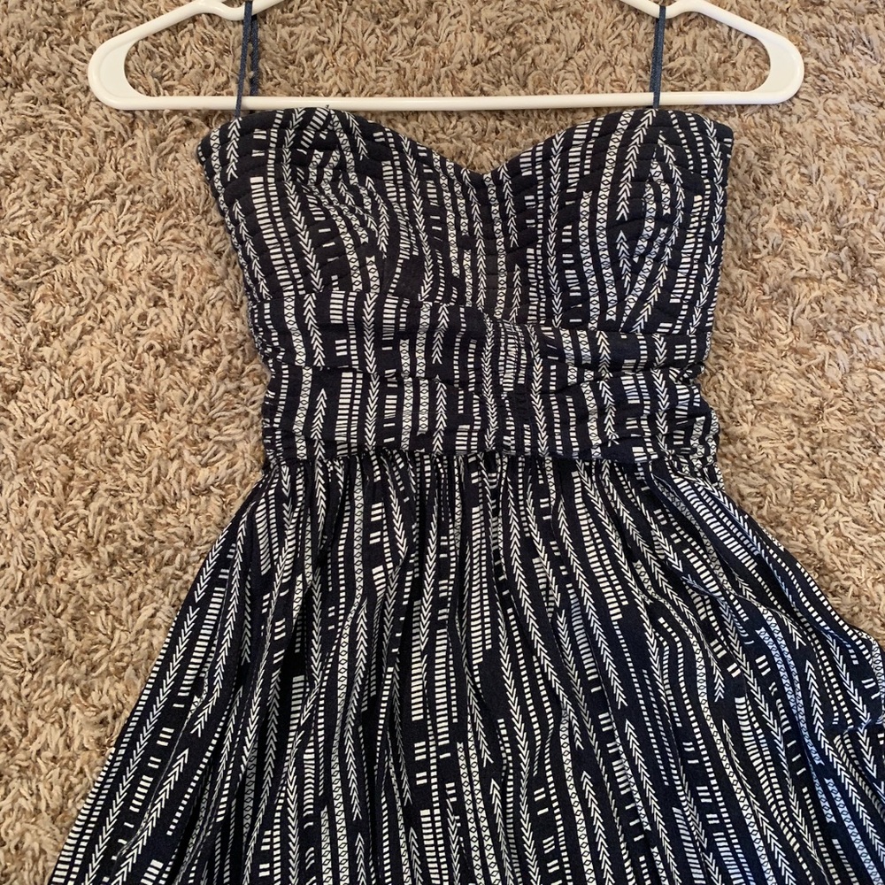 Navy strapless dress.